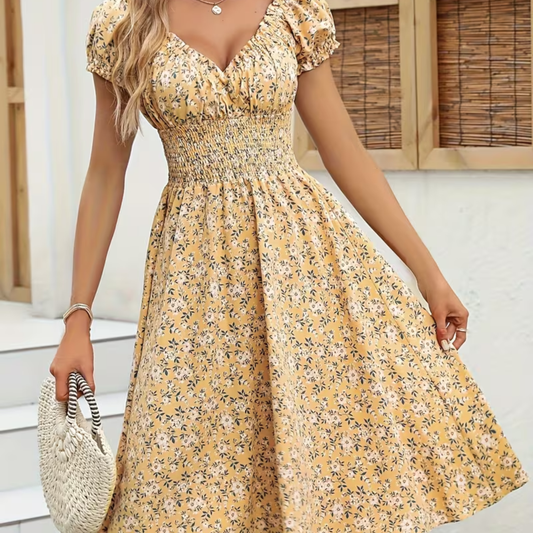 Vestido midi floral con escote en V y cintura fruncida