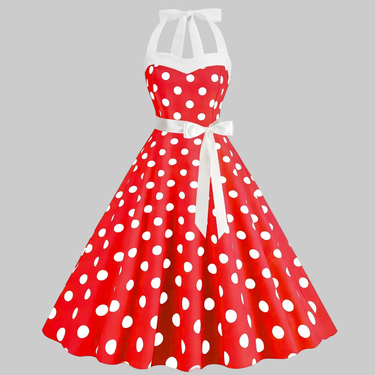 Elegantes gepunktetes Kleid mit voluminösem Rock und weitem Saum