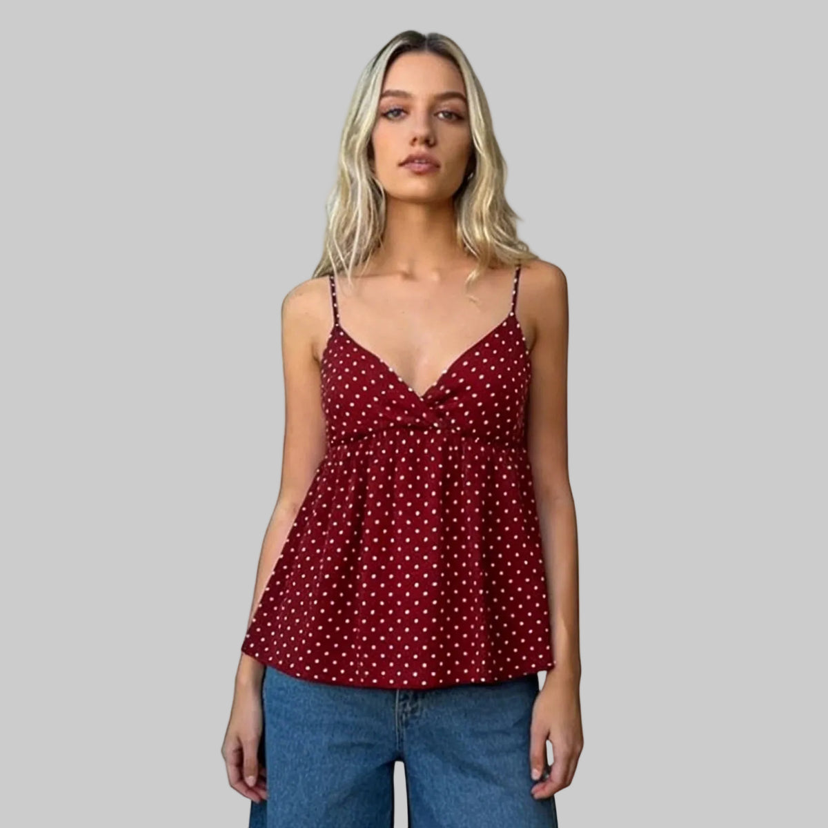 Elegantes gepunktetes Camisole mit sexy rückenfreiem Design