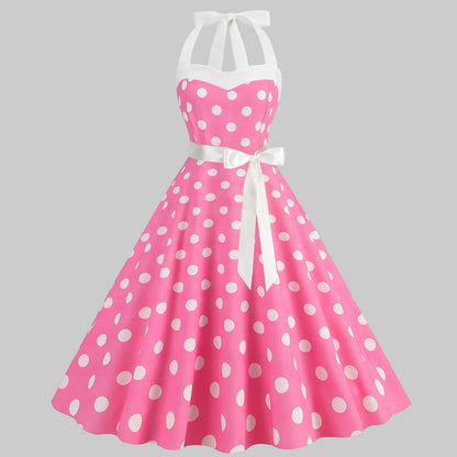 Elegantes gepunktetes Kleid mit voluminösem Rock und weitem Saum
