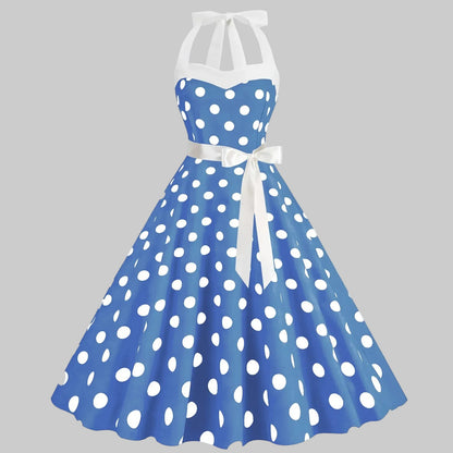 Elegantes gepunktetes Kleid mit voluminösem Rock und weitem Saum