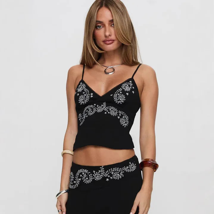 Elegantes besticktes Crop-Top mit Rückenausschnitt und Neckholder-Design