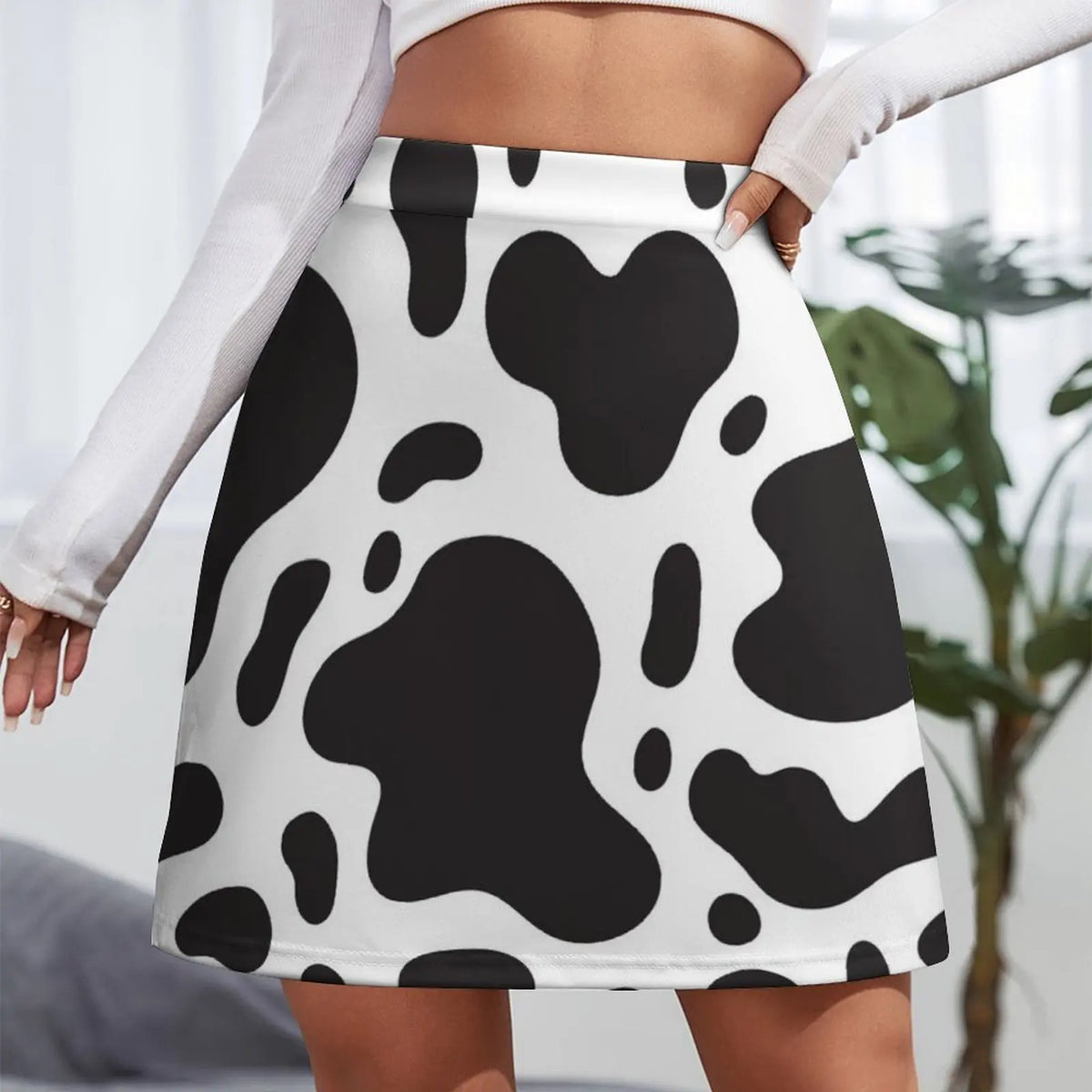 Eleganter Minirock mit Kuhmuster für verspielten, schicken Stil