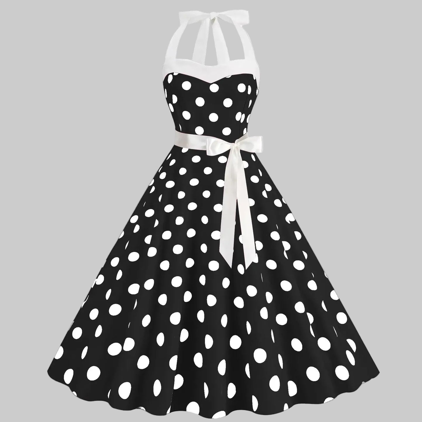 Elegantes gepunktetes Kleid mit voluminösem Rock und weitem Saum